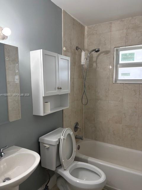828 Southwest 20th Avenue, Unit 7 Miami, FL 33135 - Photo 12 of 13 a bathroom with a sink toilet and shower
