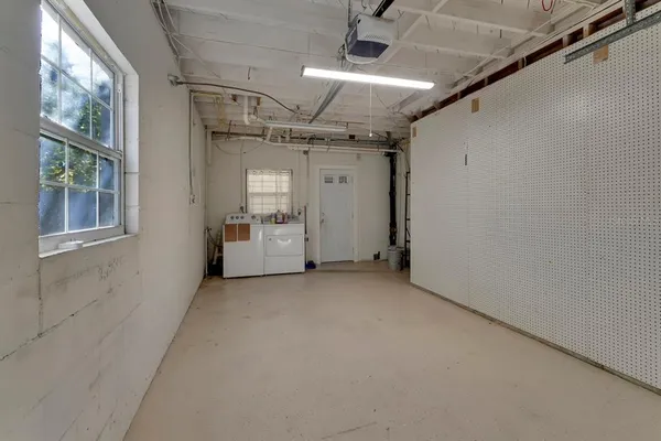 a view of empty room with windows