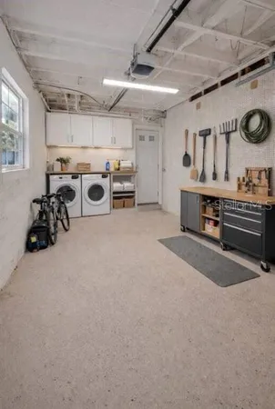 a view of storage and utility room with stainless steel appliances