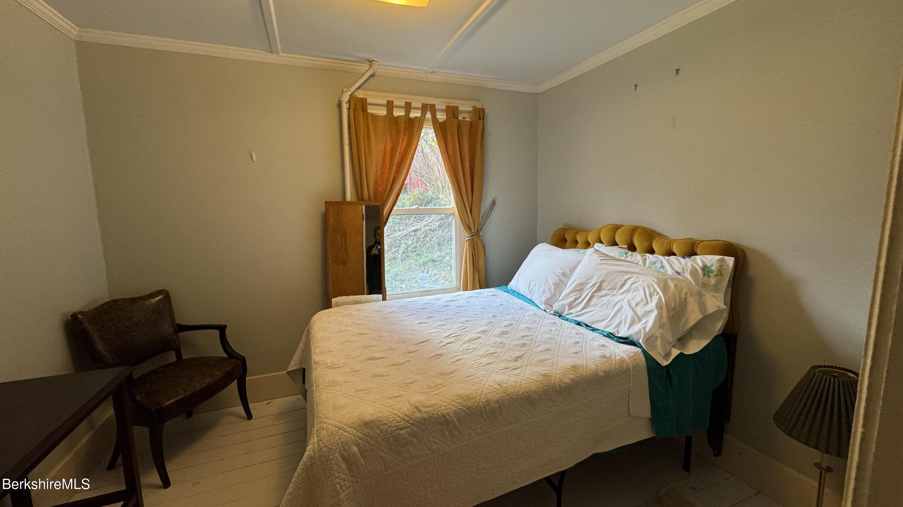 152 Furnace Street North Adams, MA 01247 - Photo 28 of 30 a bedroom with a bed and a window