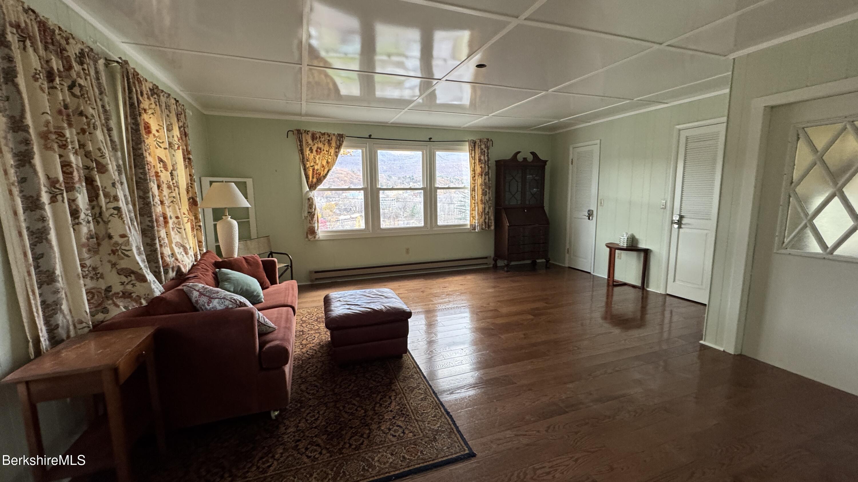 152 Furnace Street North Adams, MA 01247 - Photo 9 of 30 a living room with furniture and a large window