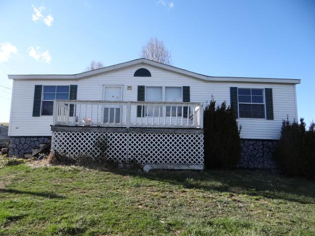 35475 Loves Mill Road Glade Spring, VA 24340 - Photo 1 of 8 a front view of a house with a yard