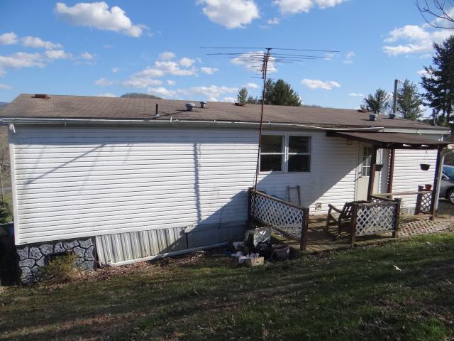 35475 Loves Mill Road Glade Spring, VA 24340 - Photo 2 of 8 a front view of a house with a yard
