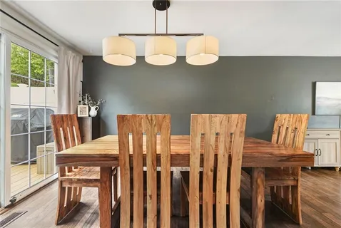 a view of hall way with furniture