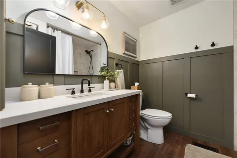 a bathroom with a sink and a toilet