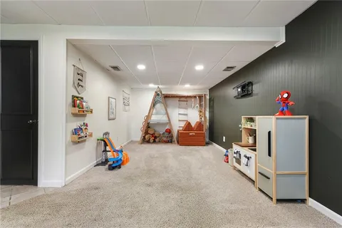 a room with toys and white walls