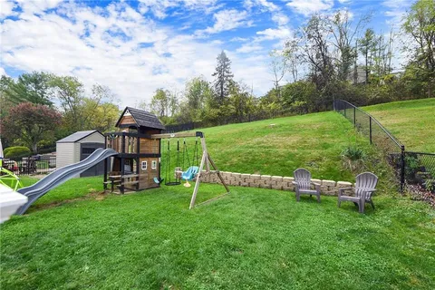 a view of a garden with a slide