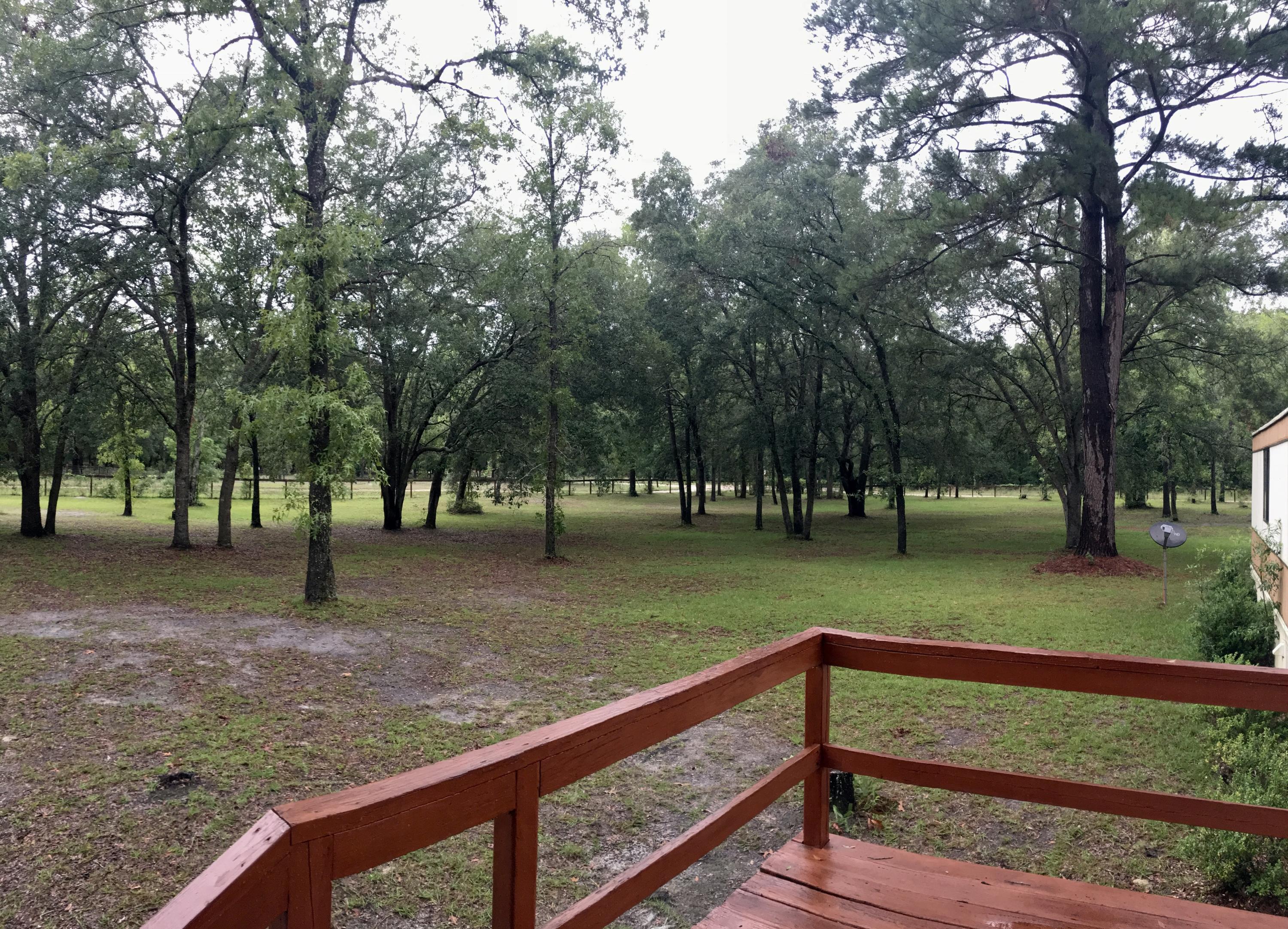 Park Like Setting - 4 Acres Cleared Lot