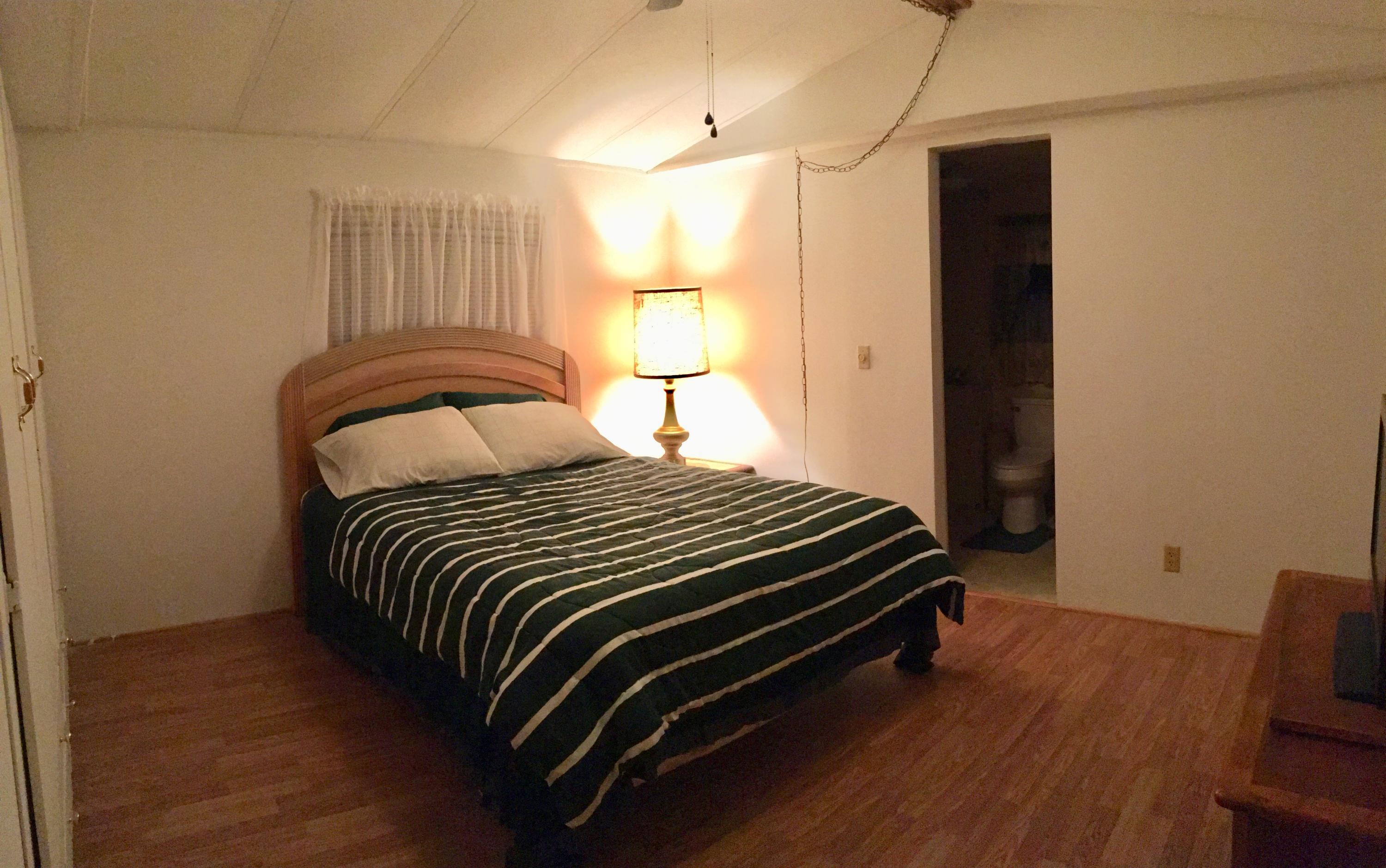 19848 33rd Road Wellborn, FL 32094 - Photo 28 of 38 Master Bedroom with an Ensuite Bathroom