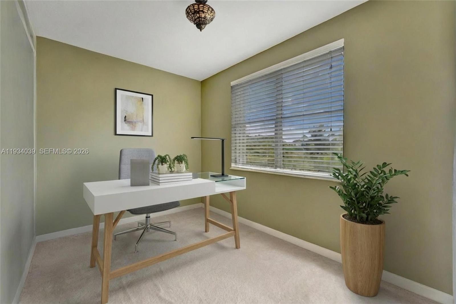 5337 Southwest 131st Terrace Miramar, FL 33027 - Photo 17 of 46 a view of a workspace with furniture