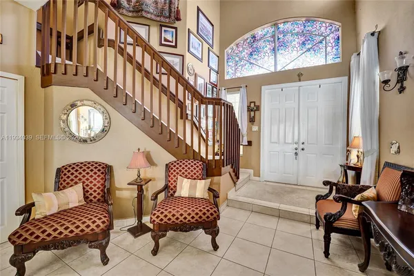 a living room with furniture and a window