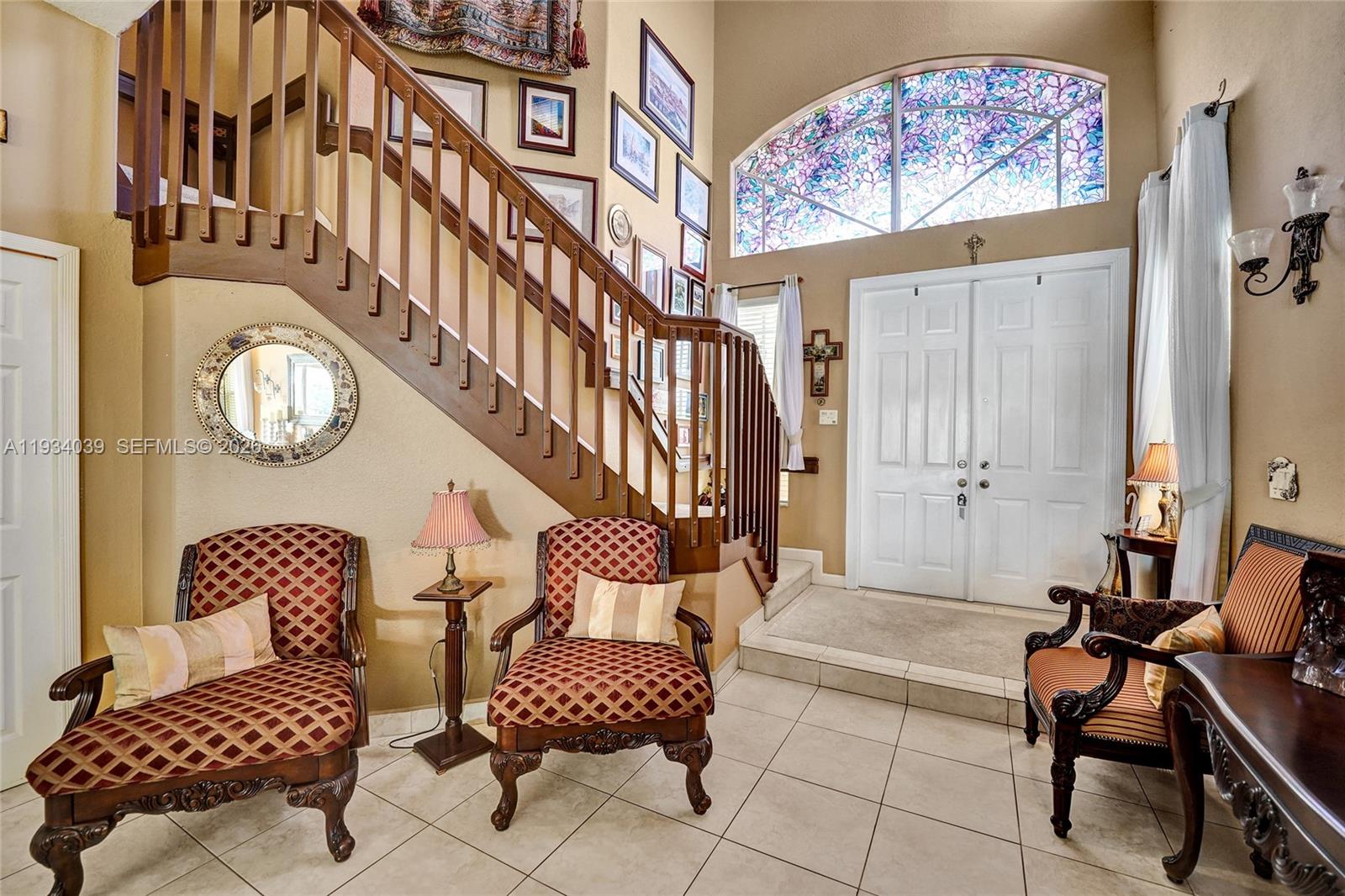 5337 Southwest 131st Terrace Miramar, FL 33027 - Photo 2 of 46 a living room with furniture and a window