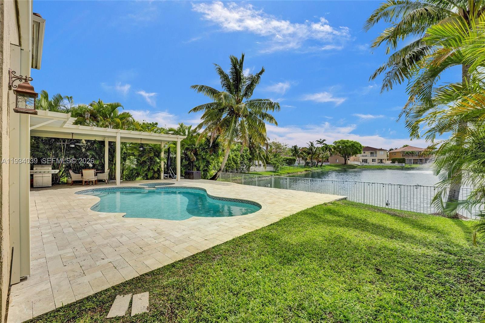 5337 Southwest 131st Terrace Miramar, FL 33027 - Photo 35 of 46 a view of outdoor space yard and swimming pool