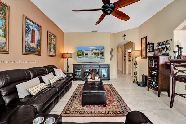 a living room with furniture and a rug