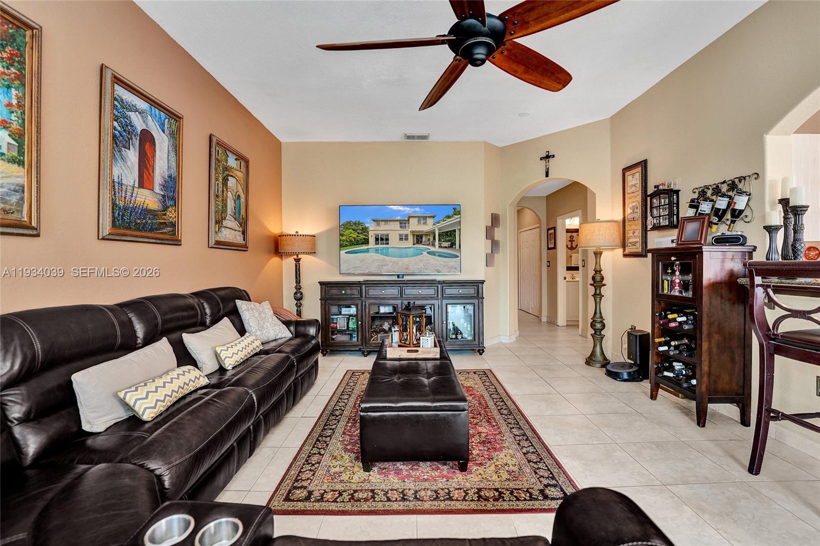5337 Southwest 131st Terrace Miramar, FL 33027 - Photo 10 of 46 a living room with furniture and a rug