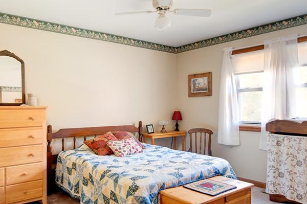 259 Malboeuf Road Ware, MA 01082 - Photo 12 of 20 a bedroom with a bed and a dresser