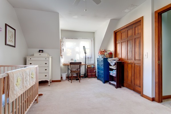 259 Malboeuf Road Ware, MA 01082 - Photo 16 of 20 a view of a bedroom with baby crib and furniture