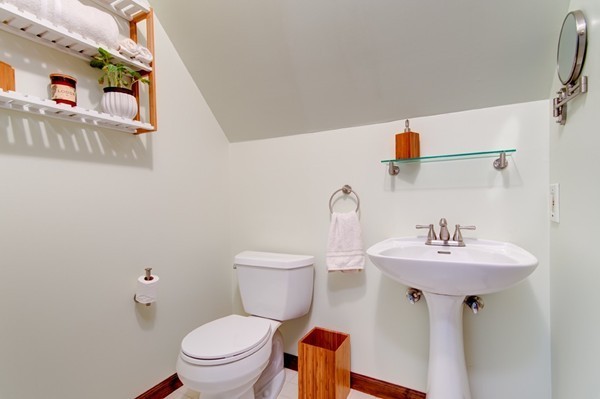 259 Malboeuf Road Ware, MA 01082 - Photo 17 of 20 a bathroom with a sink toilet and a mirror