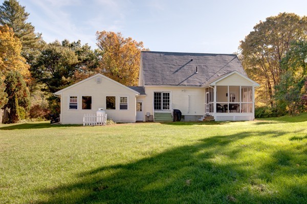 259 Malboeuf Road Ware, MA 01082 - Photo 2 of 20 a front view of a house with a yard and garage