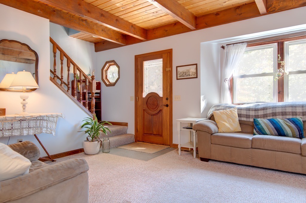 259 Malboeuf Road Ware, MA 01082 - Photo 4 of 20 a living room with furniture and a large window