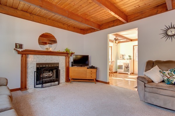259 Malboeuf Road Ware, MA 01082 - Photo 6 of 20 a living room with furniture and a fireplace