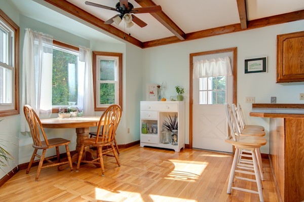 259 Malboeuf Road Ware, MA 01082 - Photo 7 of 20 a dining room with furniture a chandelier and wooden floor