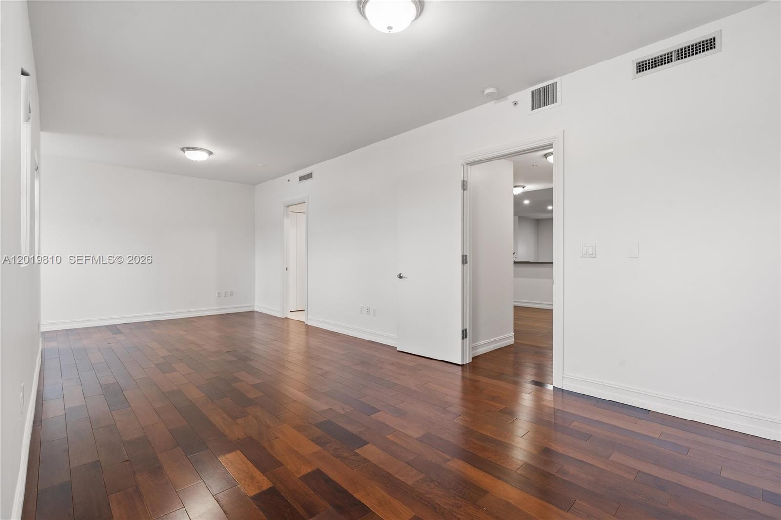 455 East Palmetto Park Road, Unit 4E Boca Raton, FL 33432 - Photo 21 of 30 wooden floor in an empty room