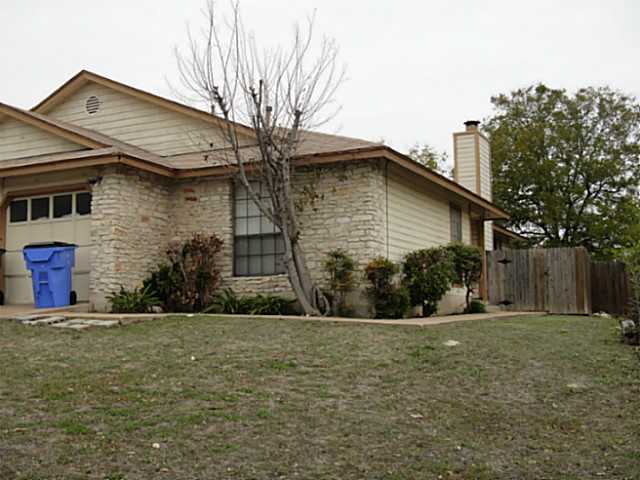 1902 Margalene Way Austin, TX 78728 - Photo 1 of 2 a front view of house with yard