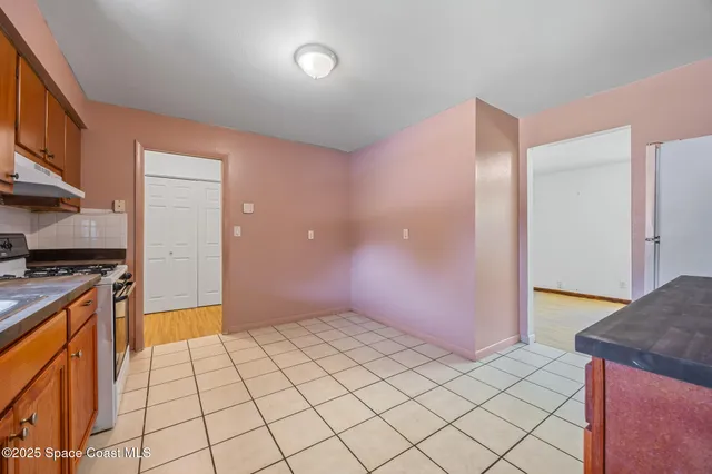 a view of kitchen with windows