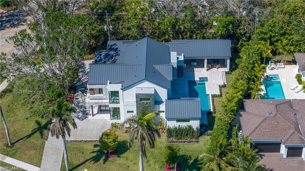 1800 Crayton Road Naples, FL 34102 - Photo 24 of 32 View of subject property with a pool area