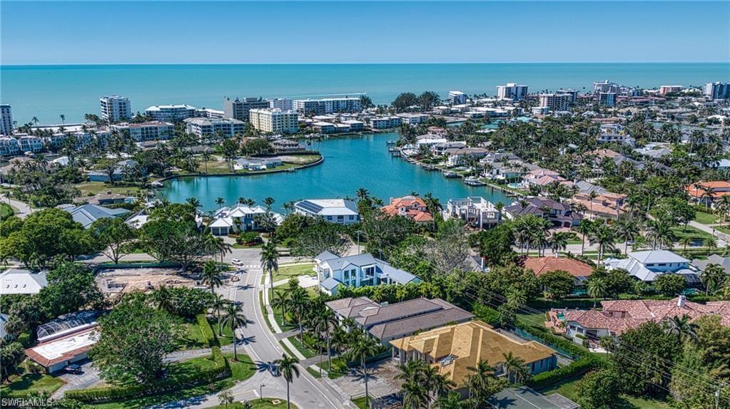 1800 Crayton Road Naples, FL 34102 - Photo 25 of 32 View of urban area featuring a nearby body of water and nearby suburban area