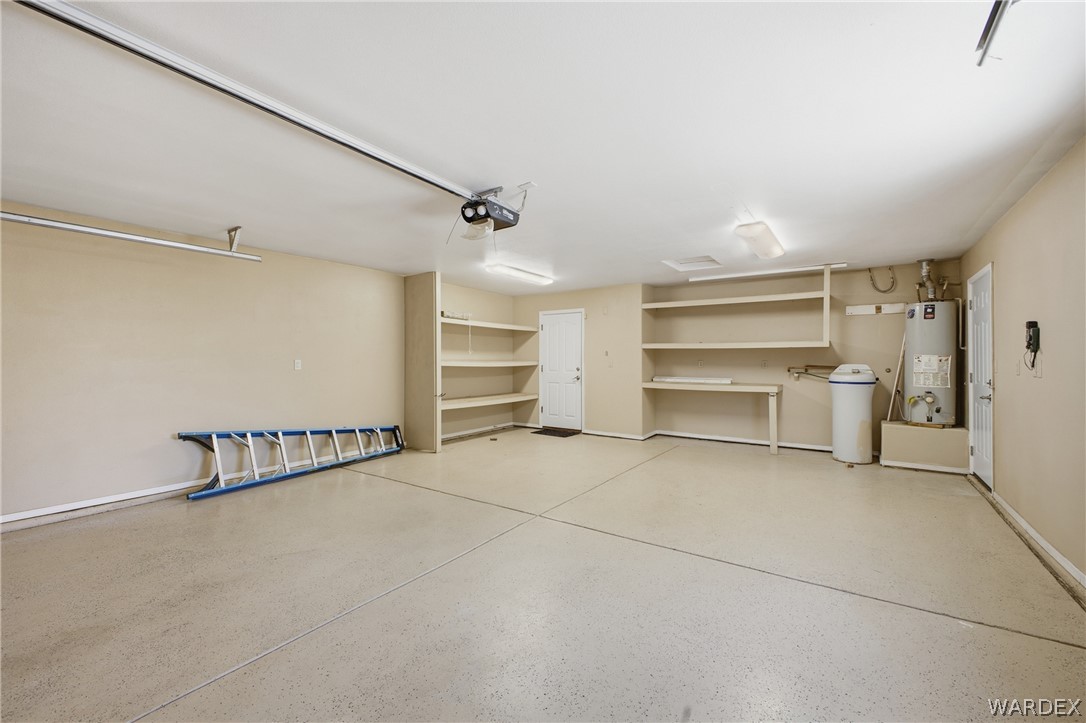 3918 North Eagle Rock Road Kingman, AZ 86409 - Photo 33 of 44 a view of an empty room with a ceiling fan