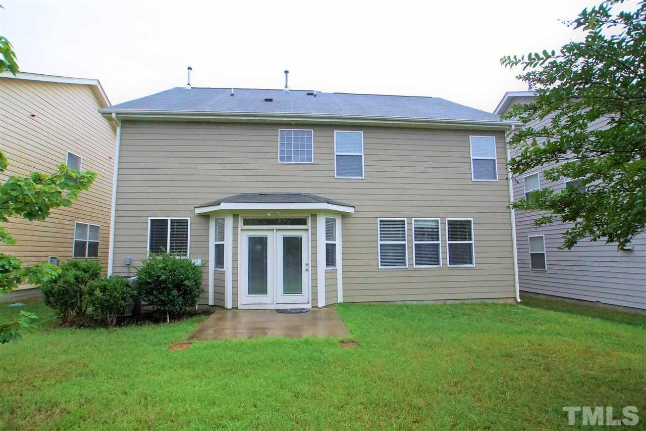 509 Front Ridge Drive Cary, NC 27519 - Photo 2 of 30 a view of a house with a backyard