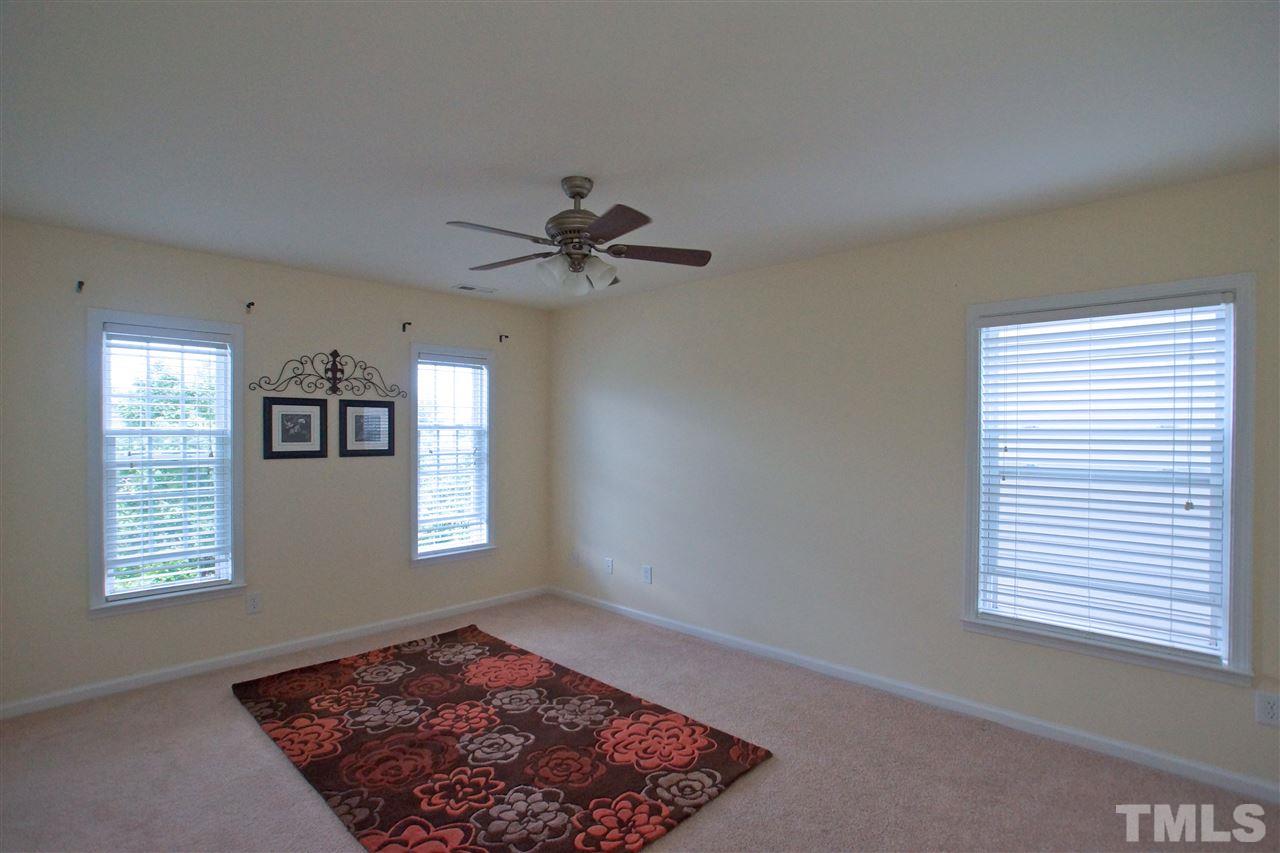 509 Front Ridge Drive Cary, NC 27519 - Photo 20 of 30 a view of an empty room and window