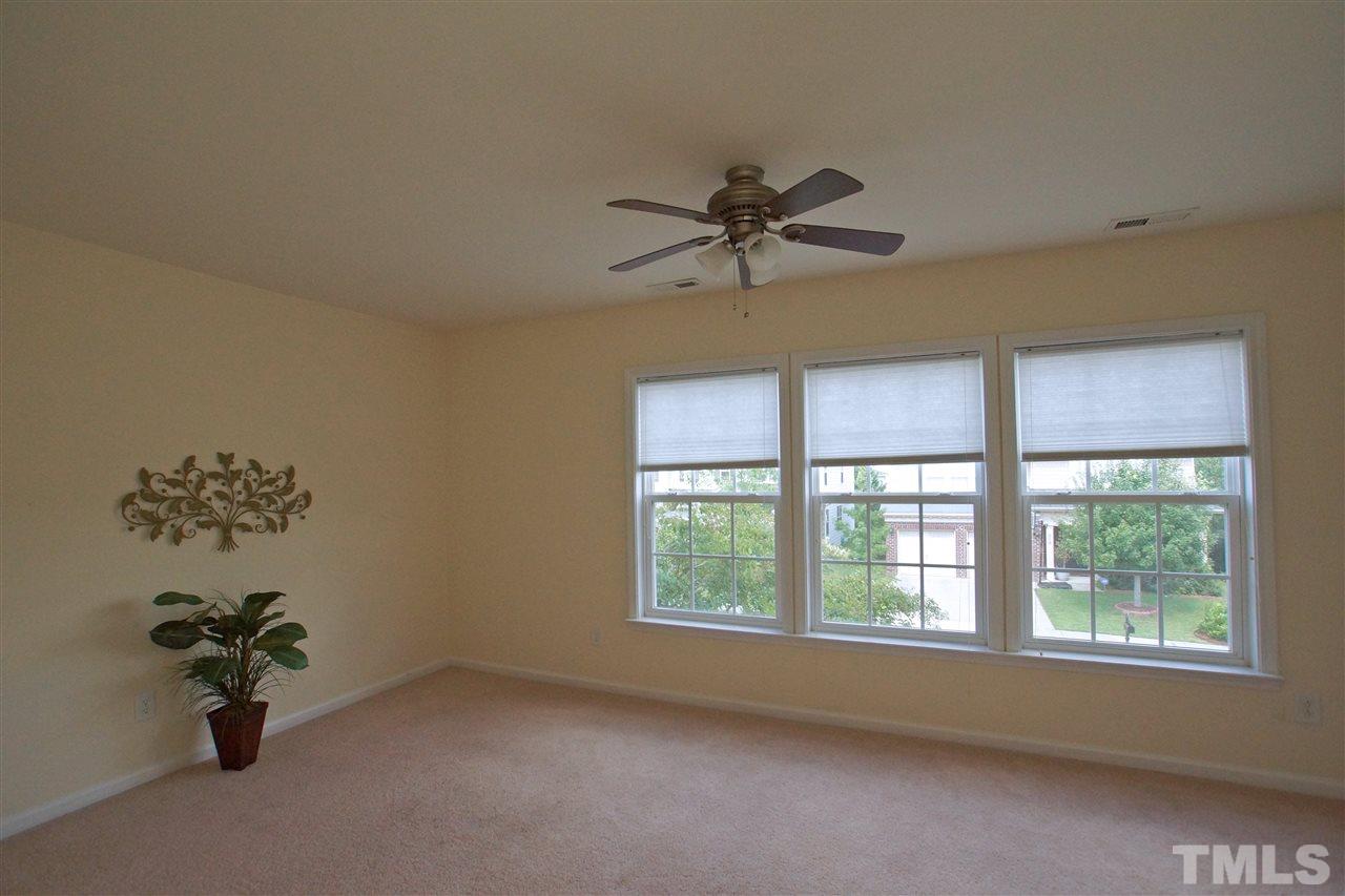 509 Front Ridge Drive Cary, NC 27519 - Photo 22 of 30 a view of an empty room with a window