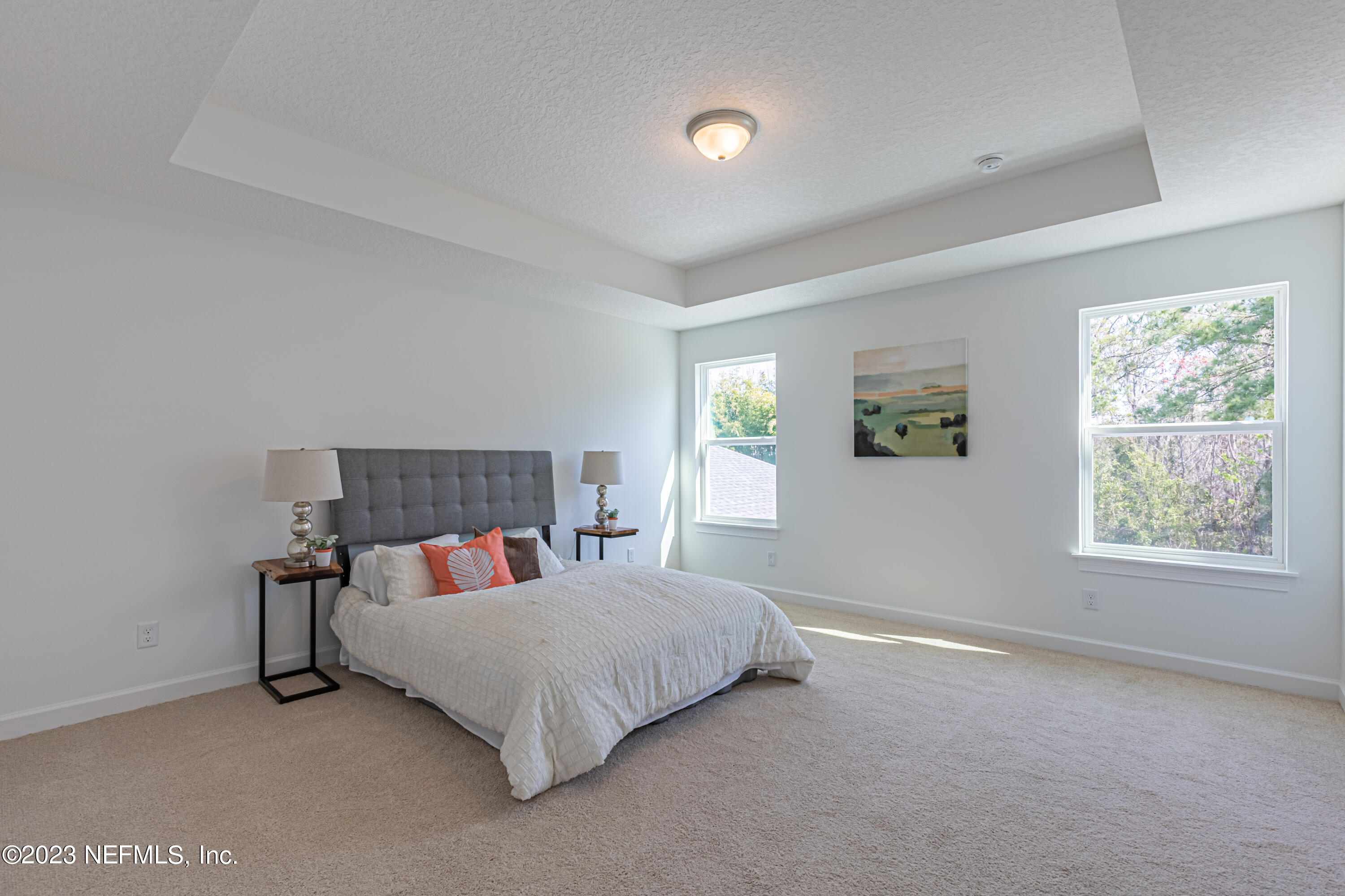 3093 Orange Picker Road Jacksonville, FL 32223 - Photo 22 of 39 a bedroom with a bed and window