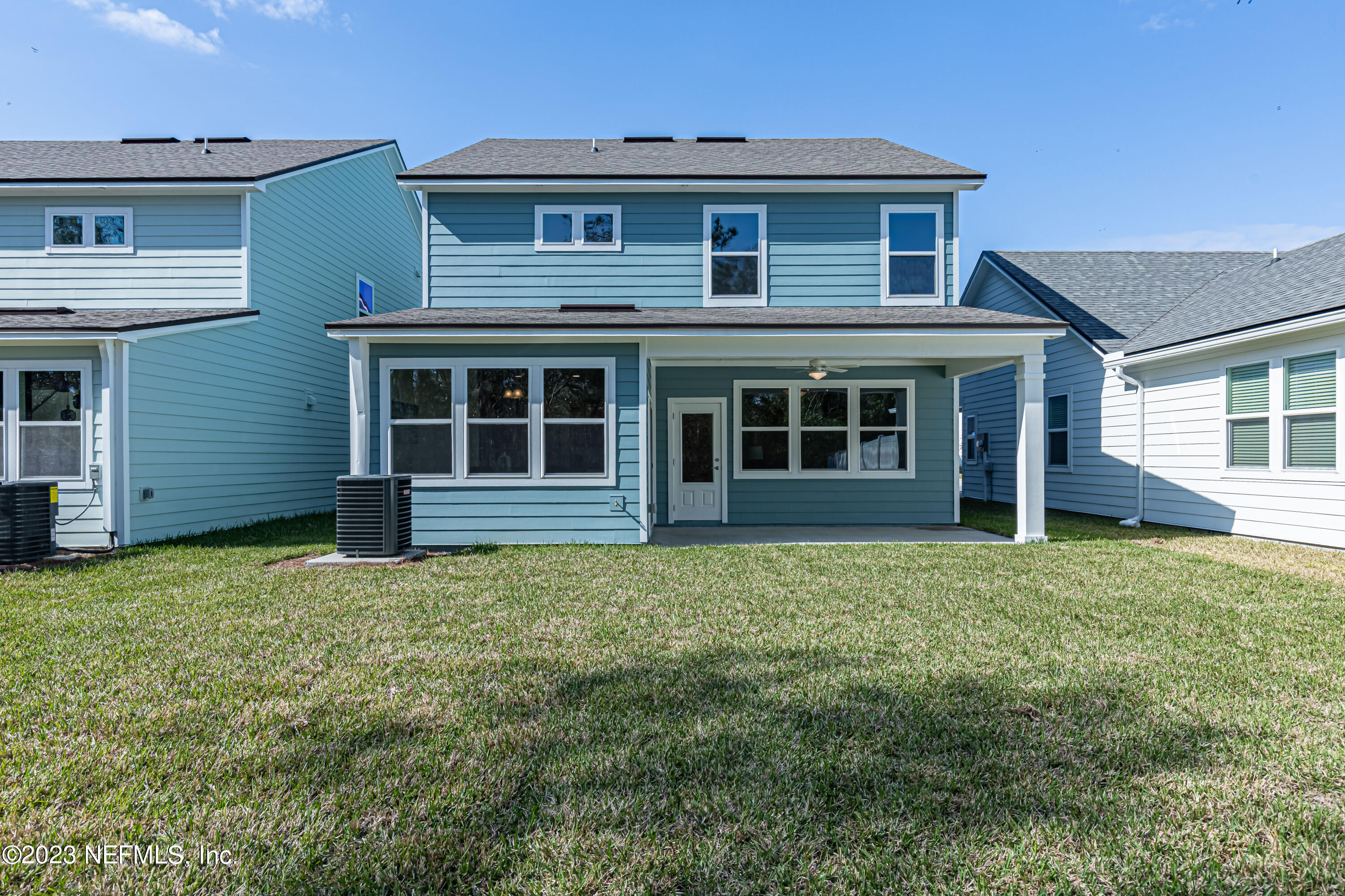3093 Orange Picker Road Jacksonville, FL 32223 - Photo 37 of 39 a front view of a house with a garden