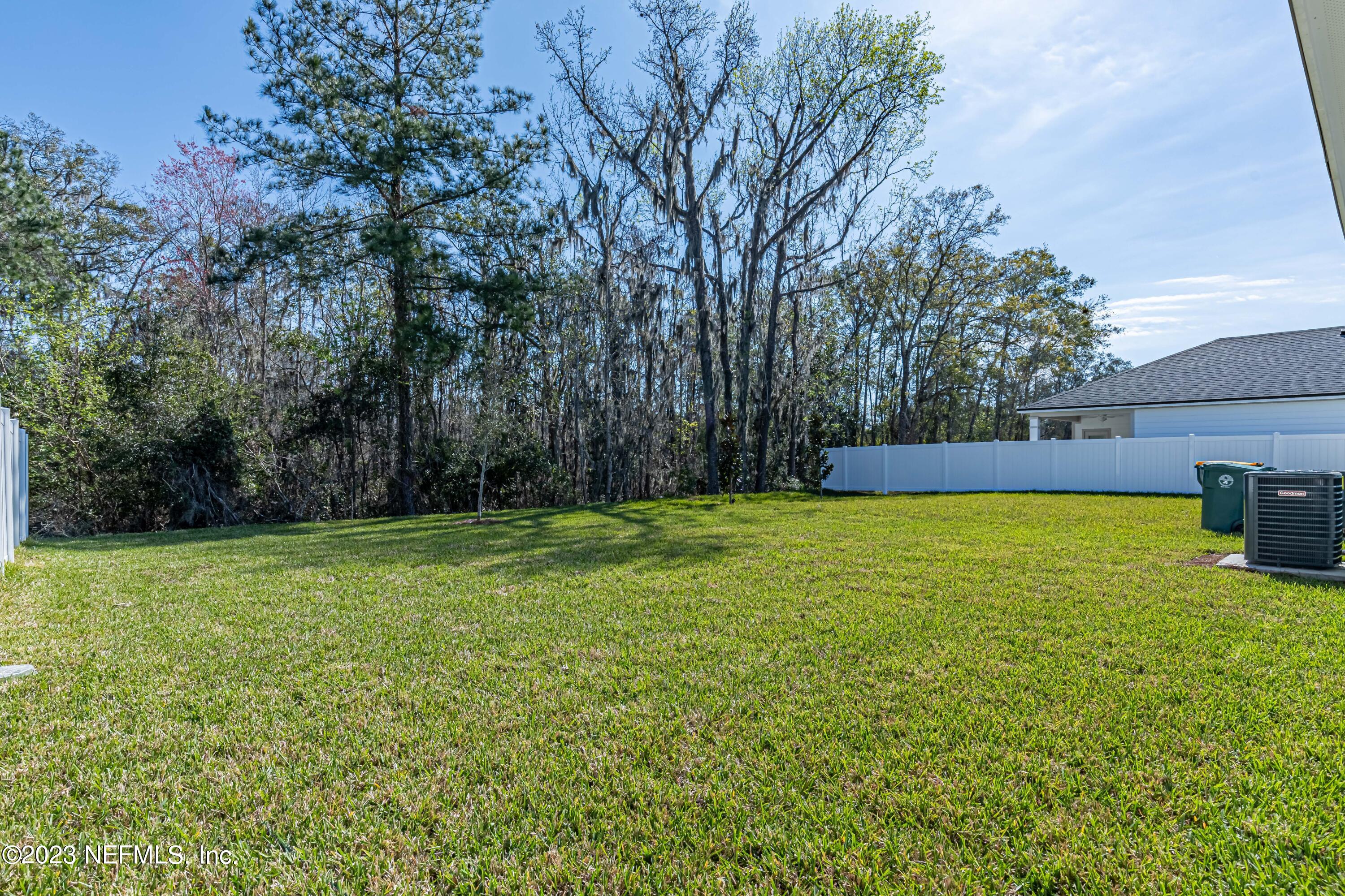 3093 Orange Picker Road Jacksonville, FL 32223 - Photo 39 of 39 a view of a yard with a trees