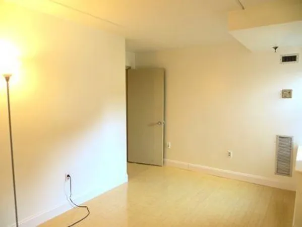 a view of a room with wooden wall