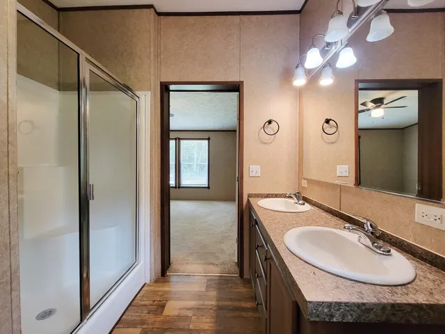 a view of a bathroom with a sink and a window
