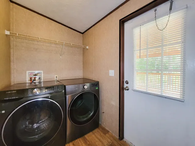 a utility room with dryer and washer