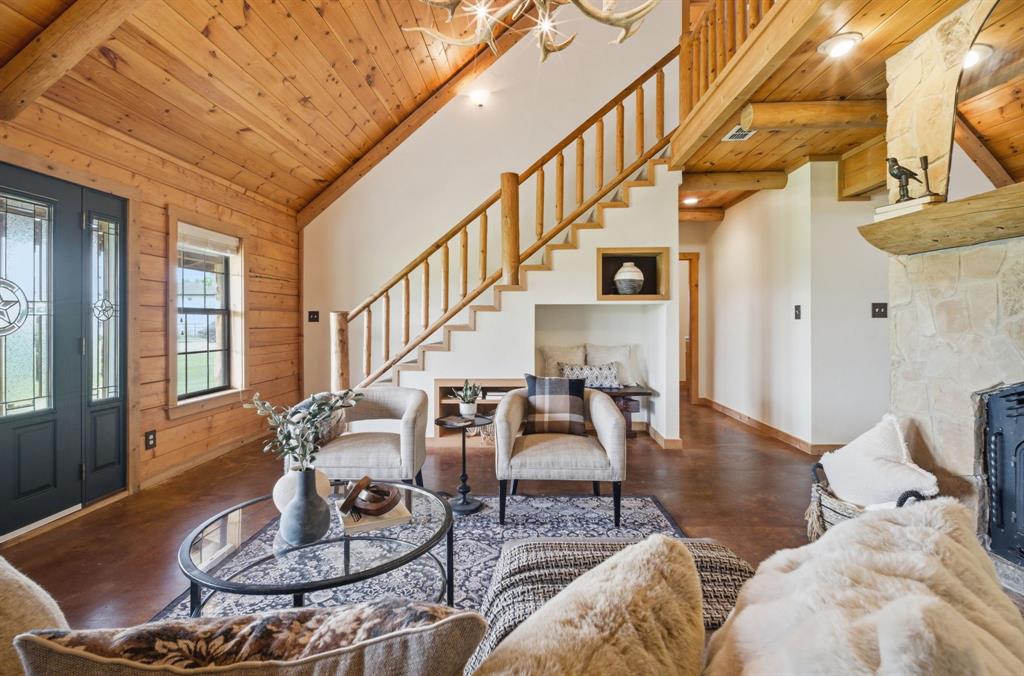 465 Emberson Ranch Road Pilot Point, TX 76258 - Photo 7 of 40 a living room with furniture and wooden floor