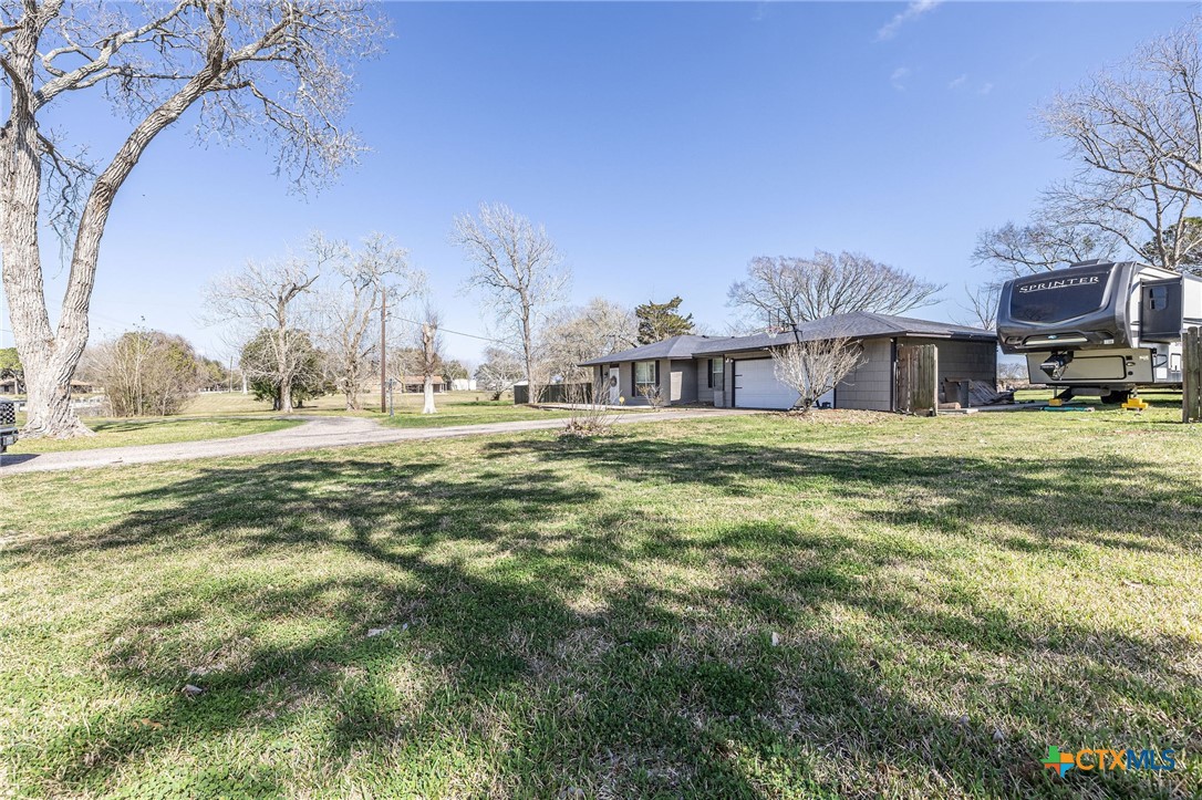 743 Royal Road Port Lavaca, TX 77979 - Photo 3 of 21 a view of a town with large trees