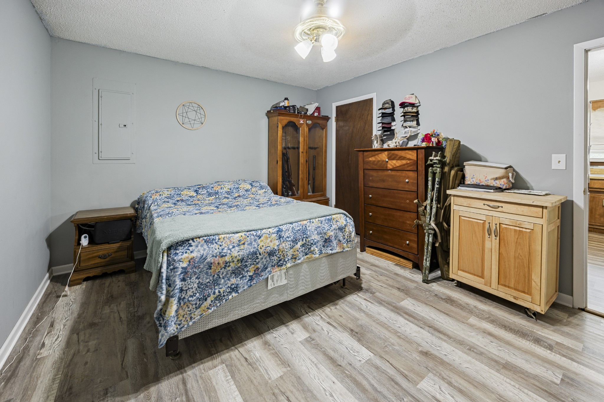 421 Shady Grove Road Flintville, TN 37335 - Photo 16 of 33 a bedroom with a bed and cabinets
