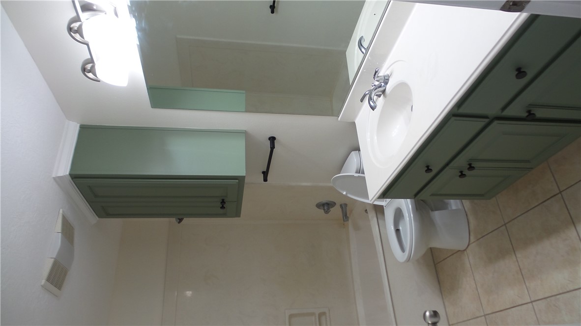 114 Rugen Lane College Station, TX 77845 - Photo 16 of 22 a bathroom with a sink toilet and shower