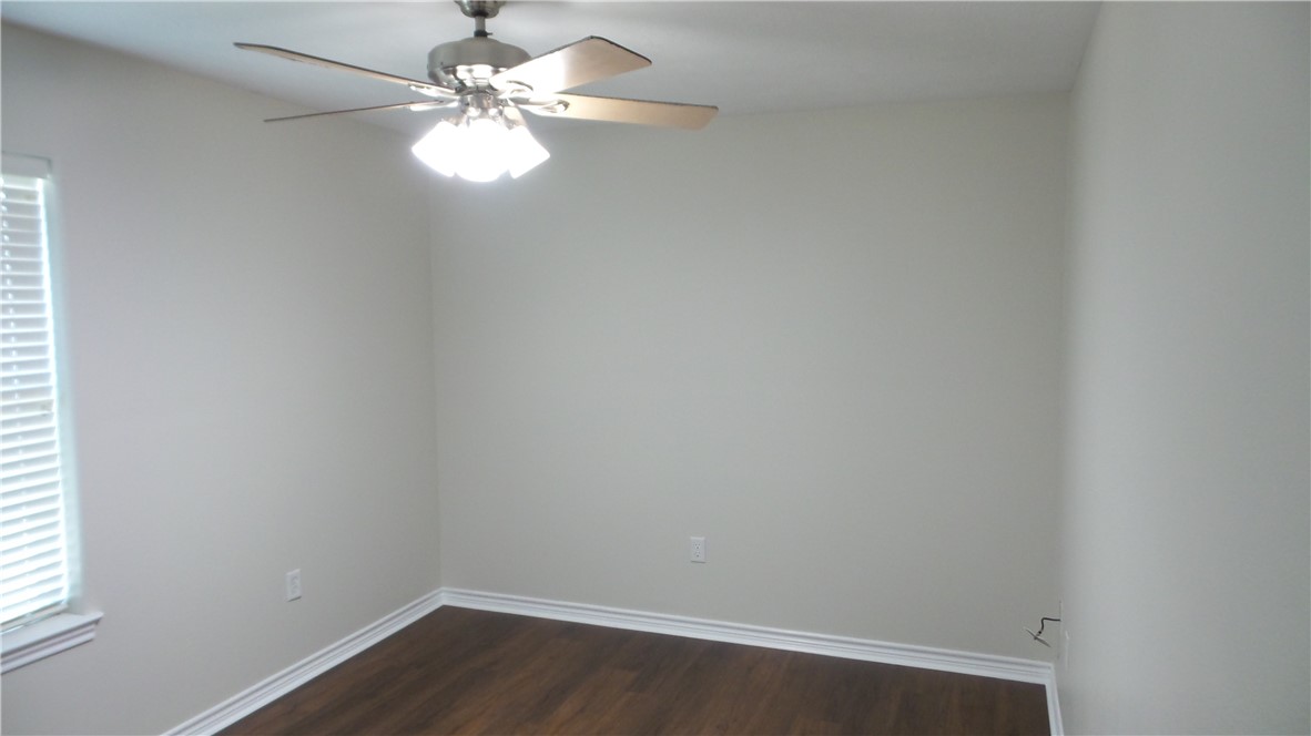 114 Rugen Lane College Station, TX 77845 - Photo 18 of 22 an empty room with a window and a fan