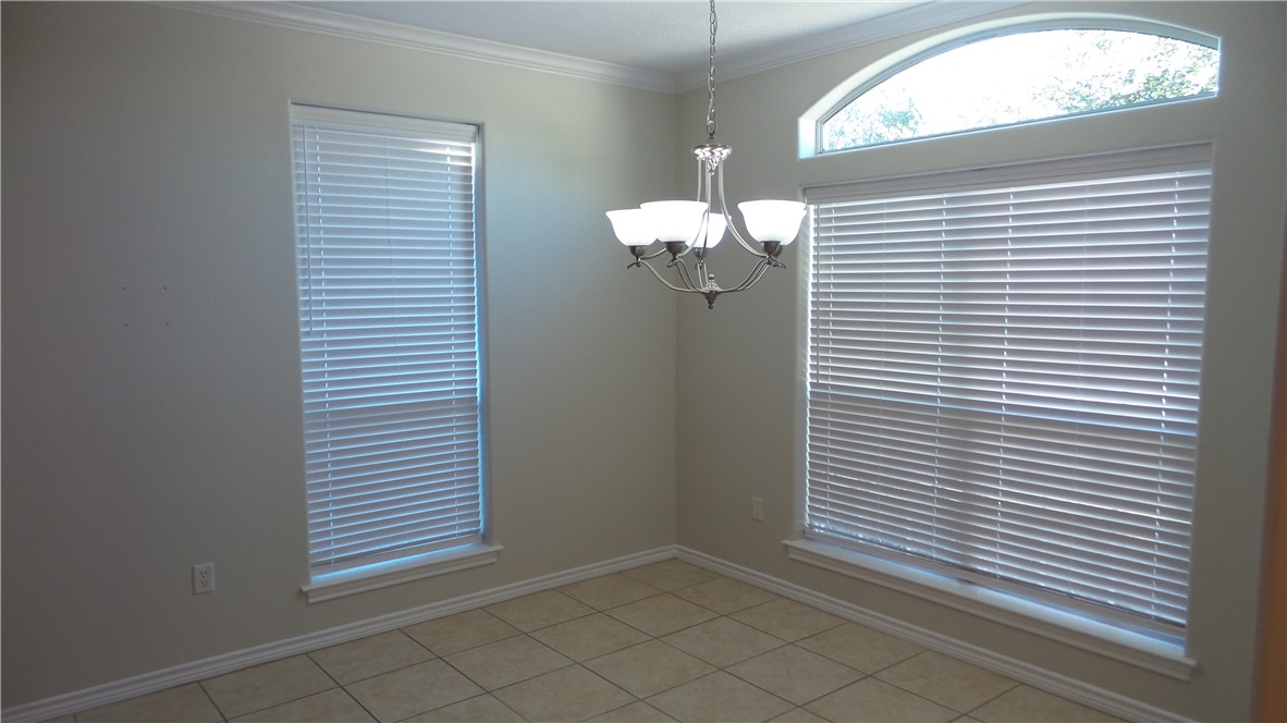 114 Rugen Lane College Station, TX 77845 - Photo 9 of 22 a view of a room that has a window in it