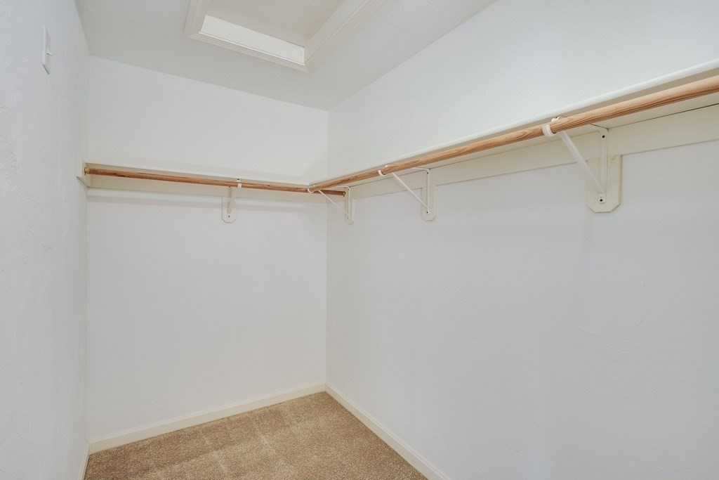 16 North Ridge Road, Unit 16 Mashpee, MA 02649 - Photo 23 of 42 a view of a room with racks on the wall