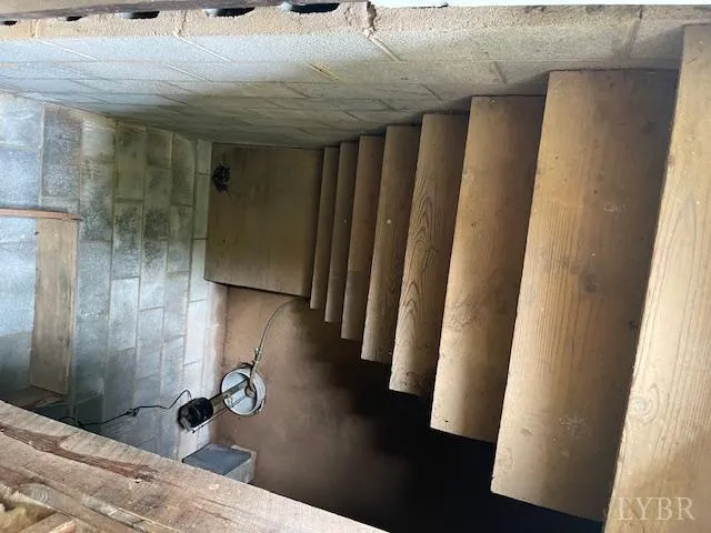 a bathroom with a tub and shower