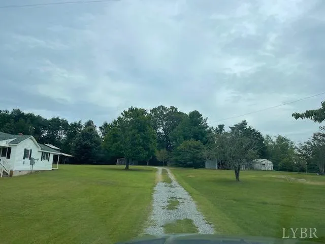 a view of a house with a big yard